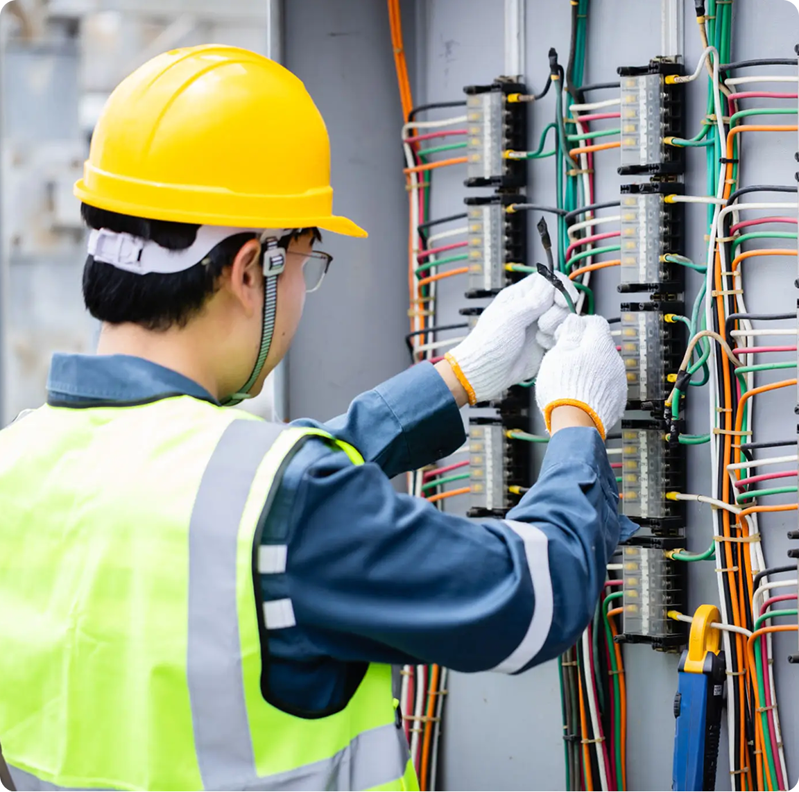 Worker handling electrical wires